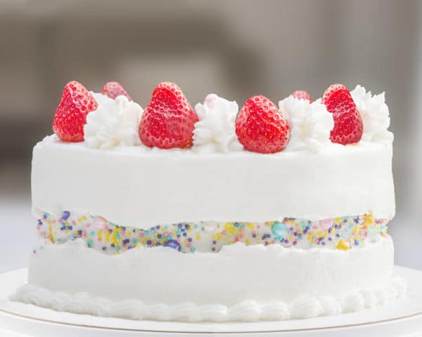 Faulty edge Strawberry Vanilla Cake - custom cakes in Toronto